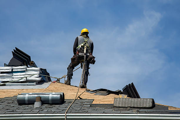 Professional Roof Replacement technician working in Washington, NH